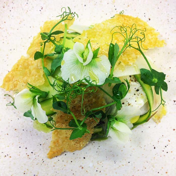 Smoked burrata asparagus pea flowers parmesan and lemon olive oil